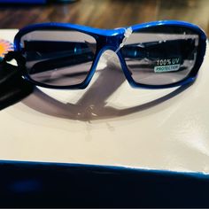 New Blue Sunglasses For Men/Woman/ Kids Comes With Bag Blue Mirrored Sunglasses For Travel, Trendy Blue Sunglasses For Travel, Blue Sunglasses For Summer Travel, Blue Tinted Sunglasses For Travel, Blue Tinted Lenses Sunglasses For Travel, Casual Blue Sunglasses For Travel, Travel Blue Tinted Sunglasses, Trendy Blue Sunglasses For Outdoor Activities, Blue Sunglasses For Summer Outdoor Activities