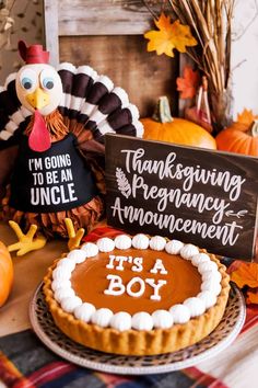 a thanksgiving themed table with a turkey and pie