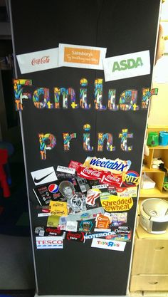 a refrigerator covered in stickers and magnets with the word pride written on it