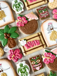 some decorated cookies are laying on a table