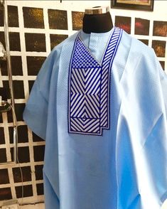 3 Piece Blue Swiss Cotton Agbaga Set, African Shirt Set With Matching Pant, Nigerian Men Native Suit, Men Ethnic Traditional Wear A head turner for quality & utmost attention to detail, this sky blue Agbada men's suit set is handmade with love. It is suitable for all kinds of Nigerian and African weddings, parties, dinners, conferences, workwear, and groomsmen asoebi outfits. This set comes with matching pants. This is a great piece of fabric design handmade in Africa to bring you some Royal Afr Blue Agbada With Traditional Patterns For Ceremonies, Blue Traditional Agbada For Ceremonies, Blue Agbada For Traditional Ceremonies, Traditional Blue Agbada For Ceremonies, Traditional Blue Agbada With Traditional Patterns, White Native Wears For Men, Blue Agbada, Native Wears For Men, Agbada Outfit