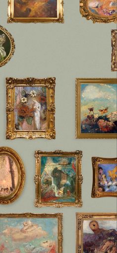 a wall with many paintings on it and one has a gold frame in the middle