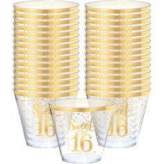 gold foiled cups with the number sixteen on them