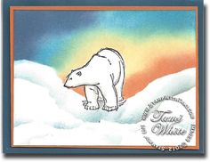 a polar bear is walking in the snow with an orange and blue sky behind it