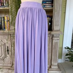 Unwine Skirt Size S Pastel Lavender 1.75" Wide Elasticized Waistband Jersey Knit Full Gathers Pockets In Side Seams Waist: 27.5" Length: 31.5" (Measured Down Center Back From Top Of The Waistband) Nwot Retail $121.00 Purple Flowy Skirt With Elastic Waistband, Purple Stretch Skirt With Elastic Waistband, Spring Purple Pleated Maxi Skirt, Purple Pleated Flowy Maxi Skirt, Flowy Lavender Lined Skirt, Relaxed Purple Pleated Maxi Skirt, Purple Relaxed Pleated Maxi Skirt, Purple Flowy Pleated Maxi Skirt, Fitted Purple Pleated Maxi Skirt