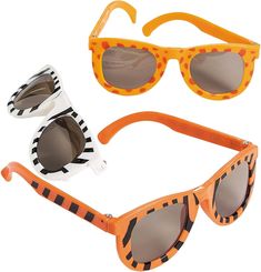 three pairs of children's sunglasses with orange frames and zebra print on the sides