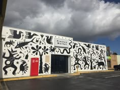 a large building painted with black and white designs