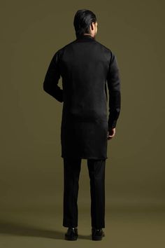 Black full sleeves round collar kurta with all over linear stitch line embroidery and pintucks detail on one side. Paired with a trouser. - Aza Fashions Embroidered Nehru Jacket With Long Sleeves For Work, Embroidered Nehru Jacket For Work With Long Sleeves, Embroidered Nehru Jacket For Work, Classic Long Sleeve Semi-formal Sets, Elegant Embroidered Kurta For Work, Embroidered Long Sleeve Kurta For Work, Traditional Long Sleeve Sets For Workwear, Festive Black Long Sleeve Nehru Jacket, Fitted Sets With Button Cuffs And Long Sleeves