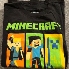 Mojang Studios Boys Xl Minecraft Shirt, Never Worn Fun Black Long Sleeve Shirt, Black Long Sleeve Shirt With Character Print, Fun Black Short Sleeve Shirt, Fun Black Shirt With Character Print, Black Shirt With Character Print, Minecraft Shirt, Minecraft Shirts, Shirt Color, Kids Shirts