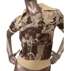 *Chia Bin   Women on Bikes Steyr All Over Print V-Neck Collar T Shirt short sleeve Circa 60s/70s. LABEL: Unbranded SIZE: Extra Small Slim Fit  MEASUREMENTS:   • Underarm: 15” • Waist: 9.5” Waist Band stretches form fitting • Sleeve: 8.5” • Shoulder-13.5” • Length: 20” • Mannequins measurements: Waist: 26", Bust: 33", Back Length: 20", Around upper arm   (sleeve is form fitting ) 10", Hips: 34"  COLOR: Multicolor   MATERIAL: 100% Cotton.  CONDITION: Deadstock, no flaws.  Care: Hand wash cold, han Upper Arm Sleeve, Band Stretches, Collar T Shirt, Steyr, Upper Arms, Collar Tshirt, Shirt Short Sleeve, Arm Sleeve, Neck Collar