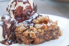 an ice cream sundae on a white plate