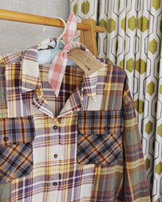 Quilt patch inspired details & the cutest plaid! We love this shirt with its button up front, fringe hem & cute front pockets. Oversized cute fit for a laid-back vibe. 100% soft brushed cotton. Color: Multi Hand wash cold Small Medium Large Bust 40 43 46 Waist 40 43 46 Hips 41 42 45 Length 22 22 23 Bust, waist, and hip measurements are a total circumference. Length is measured from the top of the shirt to the hem. Measurements are an estimate. Cute Collared Fall Shirt, Cute Collared Shirt For Fall, Cute Plaid Tops For Fall, Quilt Patch, Front Fringe, Cute Fit, Brushed Cotton, Large Bust, Plaid Shirt