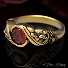 See this ring with more stones and metals: www.etsy.com/shop/doveandbunting?search_query=1528 This beautiful engagement ring features a sparkling center Ruby gemstone adorned with an art nouveau lily design. Lilies are most commonly associated with purity and fertility. The sweet and innocent beauty of the lily flower has given it the meaning of fresh life and rebirth. Cast in solid gold or platinum, this ring is made of 100% recycled metal. We make this ring in a polished with patina finish to Luxury Red Engraved Ring With Polished Finish, Luxury Red Engraved Ring With Gemstone, Luxury Red Filigree Ring, Luxury Red Signet Ring For Wedding, Wedding Ruby Ring With Intricate Design, Ornate Gold Ruby Ring, Intricate Ruby Wedding Ring, Wedding Red Ruby Ring With Stone Setting, Wedding Rings With Intricate Garnet Design