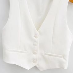 Stand out in style with our Summer Darling Waistcoat Top, the ultimate choice for owning the modern classic trend. Features a V-neckline, a vest-style top with a five-button placket at the front, and cropped angled hems. Available in four classic colors Made from quality polyester fabric Comes in XS-L Vest Style Women, Chic Top, Vest Fashion, Vest Dress, Womens Vest, Top Styles, Polyester Fabric, Vogue, Blazer