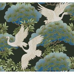 two white birds flying over green leaves on a blue background