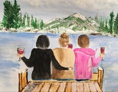 three people sitting on a bench holding wine glasses in front of a lake and mountains