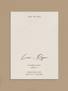 a wedding card with the words save the date written in cursive writing on it