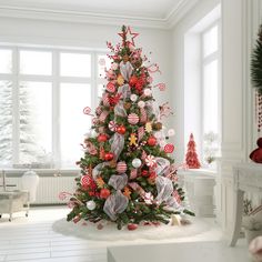 a christmas tree decorated with candy canes and candies