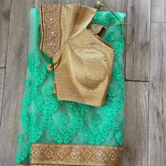 Authentic Couture Indian Sari Dress In Mint Green. Originally Bought For $800 For A Wedding But Ended Up Not Wearing Or Using. Never Worn Band New In Perfect Condition. Gold Accents On Mint Green. The Top Piece Is Gold. Then It Comes With The 2 Bottom Pieces. The Skirt Is All Mint Green Silky. The Wrap Is Mint Green And Gold Sequins. Bought From A Real Authentic Shop. Only Tried On Never Worn Out. Selling For Under Half Of The Price Bought. Tags Removed But Fits A Size 8. Designer Fitted Dress For Reception, Designer Fitted Reception Dress, Elegant Green Organza Blouse Piece, Elegant Lace Blouse Piece For Reception, Elegant Festive Lace Blouse Piece, Elegant Organza Blouse Piece With Lace Work, Elegant Dress With Sheer Dupatta For Ceremony, Designer Wedding Dresses With Dupatta, Green Dresses With Zari Work For Ceremonies