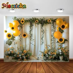 a room with sunflowers and balloons on the wall