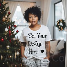 Elevate your Holiday designs with our african american Christmas tshirt mockups featuring diverse models and holiday themes and backgrounds. Don't miss the opportunity to offer your customers a unique and inclusive holiday mock-up by adding this simple t-shirt mockup to your catalog. A good mockup goes a long way with purchasing power. Very beginner friendly to use.  ❗Please remember that this is a DIGITAL file only. You will not receive a t-shirt. ❗ 📩 What's included: * 1 JPG file Resolution: African American Christmas Tshirts, Tee Shirt Mockup, Holiday Lifestyle, African American Holidays, Diverse Models, American Christmas, Purchasing Power, American Holiday, Plaid Pajama