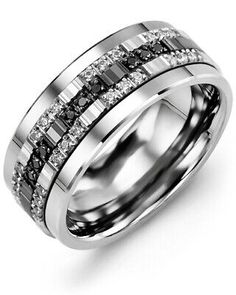 a white gold wedding ring with black and white diamonds on the outside, set in 18k white gold