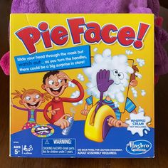 the game pie face is shown in front of a yellow box with two children on it