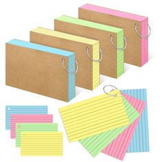 five different colored notepads are lined up