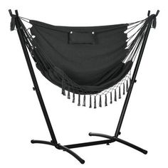 a black hammock with fringes on the bottom and straps hanging from it