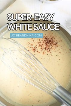 a white sauce in a bowl with a whisk on top and the words super easy white sauce above it