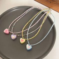 Material: Imitation pearl Color: Blue, Yellow, Purple, Pink Fashion Element: Love Heart/Heart Shape Style: Korean Korean Style Sweet Multicolor Party Jewelry, Sweet Beaded Jewelry Gift, Sweet Beaded Jewelry For Gifts, Heart Beads Necklace For Mother's Day Party, Mother's Day Party Necklace With Heart Beads, Trendy Party Beaded Necklace With Heart Beads, Multicolor Beaded Jewelry For Valentine's Day, Heart-shaped Colorful Beads For Gifts, Valentine's Day Multicolor Beaded Jewelry