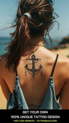 a woman with an anchor tattoo on her back