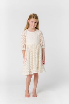 All over lace girl's dress 1/2 length sleeves Round neckline Gathered waist Button back closure Fabric content - Cotton - Dry clean only Modest Lace Dress With Lace Sleeves, Short Sleeve Lace Dress For Confirmation, Short Sleeve Lace Confirmation Dress, Spring Confirmation Dress With Lace Bodice, Spring Confirmation Lace Dress, Spring Confirmation Dress With Lace Patchwork, Spring Lace Patchwork Dress For Confirmation, Spring Lace Dress For Confirmation, Spring Dress With Lace Patchwork For Confirmation