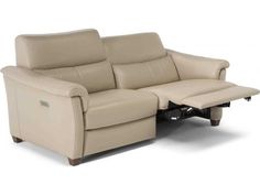 a beige leather reclining sofa sitting on top of a white floor