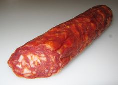 a large piece of meat sitting on top of a white counter