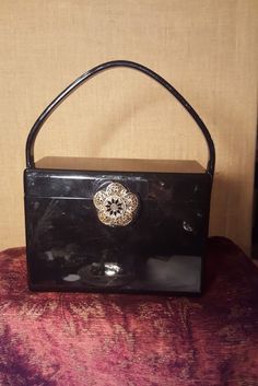 Vintage 1950's Wilardy  black lucite handbag.Great condition. Vintage Rectangular Box Bag For Party, Vintage Square Evening Bag, Vintage Rectangular Evening Bag For Formal Occasions, Vintage Square Evening Bag For Formal Occasions, Vintage Rectangular Formal Evening Bag, Black Vintage Bag For Gifts, Vintage Top Handle Evening Bag For Formal Occasions, Vintage Formal Evening Bag With Top Handle, Vintage Evening Box Bag With Detachable Handle