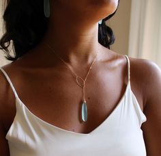 "Order both the necklace & earrings as a complete set, or, you may order JUST the earrings, or JUST the necklace using the \"Style\" drop down menu provided. Gemstone options: Black Spinel Rose Quartz (VERY low stock) Aqua Chalcedony Chocolate Moonstone Malachite Lariat details: A beautifully faceted, elongated gemstone drop is elegantly wire wrapped and suspended from the end of a dainty yet durable cable chain. A marquis shaped loop is joined to the opposite end of the chain. To secure the nec Elegant Gemstone Beads Jewelry As Gift For Her, Modern Adjustable Drop Jewelry, Modern Gemstone Beads Jewelry For Gifts, Modern Gemstone Beads Jewelry As Gift, Modern Gemstone Beads Jewelry Gift, Modern Jewelry With Gemstone Beads For Gifts, Handmade Long Drop Lariat Necklace, Unique Long Drop Jewelry For Gifts, Modern Long Drop Gemstone Jewelry