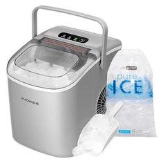 the ice maker is next to a bag of ice and a plastic container with water in it