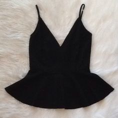 Spaghetti Strap V Neck Peplum Top. Black. Low V Back. Chic Black Camisole, Black V-neck Party Camisole, Black V-neck Camisole For Party, Chic Black Camisole For Date Night, Elegant Black Tank Top For Day Out, V Neck Peplum Top, V Neck Top, V Neck Tops, Peplum Top