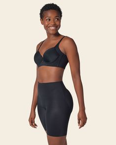 This innovative short is made of our signature DuraFit® moderate compression fabric to shape the tummy and upper thighs. The waistband is double-layered for extra shaping power in the tummy and waist. In addition to shaping, it also prevents chafing. It's soft on skin and hides cellulite for a smoothed-out look. It doesn't have any leg bands for total comfort. The back is specially designed for a natural butt-lifting effect. This shaper short has a seamless design to go undetectable under clothe Compressive Bottoms With Built-in Bra Mid-thigh Length, Sculpting Shapewear With Built-in Bra, Mid-thigh Length, Compressive Mid-thigh Shapewear With Medium Bust Support, Compression Shapewear With Built-in Bra In Elastane, Supportive Shapewear With Built-in Bra, Short Length, Mid-thigh Shaping Shapewear With Built-in Bra, Sculpting Shapewear With Contoured Waistband, Mid-thigh Length, Compressive Shapewear Briefs With Built-in Bra, Compressive Full Coverage Shapewear For Workout