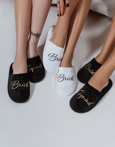 three women's feet with personalized slippers on them