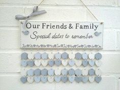 a sign that says our friends & family special dates to remember hanging on a wall