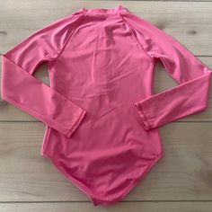 Lands End Pink Zipper Front Swimsuit. Size 10 years. Long sleeve one-piece swimsuit. Excellent used condition Lands End, Front Zipper, One Piece Swimsuit, Size 10, One Piece, Zipper, Long Sleeve, Pink