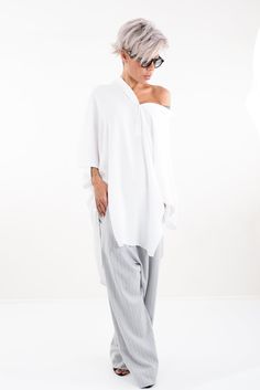 "* Oversized Fit * Wide Sleeves * Side Slits * Asymmetric Length * Dropped Shoulder * Model is 1.64cm (5ft 3\") tall, 50 kg (110Lbs) and wears size Small Clothes By Locker Room SIZE CHART (These measures are BODY measures NOT of the clothes) SIZE XS US/Canada 2 UK 4 Europe 32 Australia 6 Japan 5 Bust: around 33 in/84 cm Waist: around 26 in/66 cm Hip: around 35.5 in/90 cm Approx height: 5'7\"/170 cm SIZE S US/Canada 4/6 UK 6/8 Europe 34/36 Australia 8/10 Japan 7/9 Bust: around 35 in/88 cm Waist: White Summer Shirt, Sweet Clothes, Drop Crotch Pants, Harem Pants Women, Hippie Pants, Oversize Shirt, Small Clothes, Oversized Tunic, Women Pants