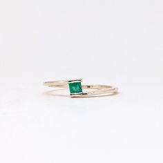 Natural Fine Emerald Ring. Baguette Stone Ring. Precious Gemstone Ring in 14k SOLID GOLD For Her from our Capsule Jewelry Collection. Emerald Baguette Gemstones are set in Chenal Setting in our Factory. Gold Ring AA+ Quality. Perfect Gift For Everyday or May Birthstone Gift for Your Loved Ones. ►  DIMENSIONS : ◆ Gemstone : Emerald 0.30 Cts         ◆ Stone size : 3*3 mm  Sapphire                                      ◆ Shank Width : 1 mm      ◆  Material :  14k Yellow Gold          Made to Order      EACH Ring is Stamped With 585 Marked As 14k GOLD International Standard. All my gemstones are hand-selected for best quality assurance, then precisely sawed, and shaped into the desired geometry. The precious stones are then delicately grinned, sanded, and hand-polished to make sure each Ring ha Minimalist Stackable Emerald Cut White Gold Rings, Minimalist Stackable White Gold Emerald Cut Rings, Minimalist White Gold Stackable Rings With Emerald Cut, Emerald Cut Solitaire Rings For Everyday, Everyday White Gold Rings With Emerald Cut, Everyday White Gold Emerald Cut Ring, Emerald Cut Bezel Setting Rings For Everyday, Minimalist Emerald Cut Rings For Everyday, Dainty Emerald Cut Bezel Set Rings