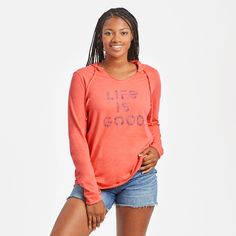 Light and so right with a playful hood. Think the softest tee you never want to take off. Plus, stand-out raw edge detail at the neck, cuffs, and hem. 100% USA Grown Cotton Jersey 4.57 oz. Lightweight jersey in fine yarn for added drape. Garment washed for softness. Hooded V-neck with self-fabric draw cord, raw edge detail at neckline, cuffs, and hem. Longer sleeves add to laid-back style. Do what you love. Love what you do.® locker patch. Printed graphic. Imported | Life is Good Women's LIG Flo Casual Hooded Relaxed Fit T-shirt, Cozy Fit Tops With Drawstring Hood For Loungewear, Cozy Fit Lounge Tops With Drawstring Hood, Casual Hooded Top With Graphic Print, Comfortable Hoodie With Drawstring, Casual Cozy Fit Top With Drawstring Hood, Casual Soft-washed Hoodie For Spring, Sporty Tops With Drawstring Hood And Cozy Fit, Sporty Tops With Cozy Fit And Drawstring Hood