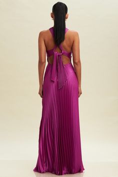 Product Details: Elevate your evening attire with our stunning Pleated Cross Over Maxi Dress. This elegant dress features a sophisticated cross-over halter neckline that beautifully accentuates the shoulders and a delicate keyhole detail at the front. The back showcases an eye-catching design with a tie that adds a touch of allure. The fully pleated skirt flows gracefully with every step, offering a timeless and chic silhouette. Perfect for formal events, weddings, or any special occasion, this Magenta Maxi Dress, Raspberry Wedding Color, Byron Wedding, Magenta Dresses, Magenta Bridesmaid Dresses, Fuschia Bridesmaid Dresses, Moh Dress, Raspberry Wedding, Magenta Dress