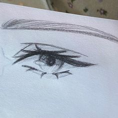 a pencil drawing of a woman's eye