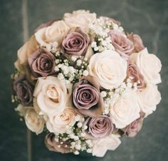 a bridal bouquet with pink and white flowers