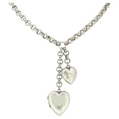 This is a vintage sterling silver belcher charm necklace. The necklace has two charms attached throughout the chain including a puffy engraved silver heart and an engraved silver heart locket. The whole chain and charms have been made in sterling silver. Condition: Used (Very Good) Weight: 52.7 grams Chain Length: 22 inches Overall length: 24 1/2 inches Chain Width: 6mm Marked: 'Sterling' Period: Vintage Box: Plain Gift Box Silver Heart Locket, Heart Charm Necklace, Silver Engraving, Vintage Heart, Vintage Box, Heart Locket, Jewelry Vintage, Silver Heart, Heart Charm